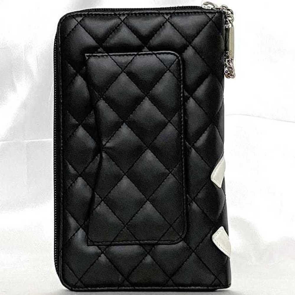 CHANEL Black Lambskin Leather Logo Wallet - Picture 3 of 11